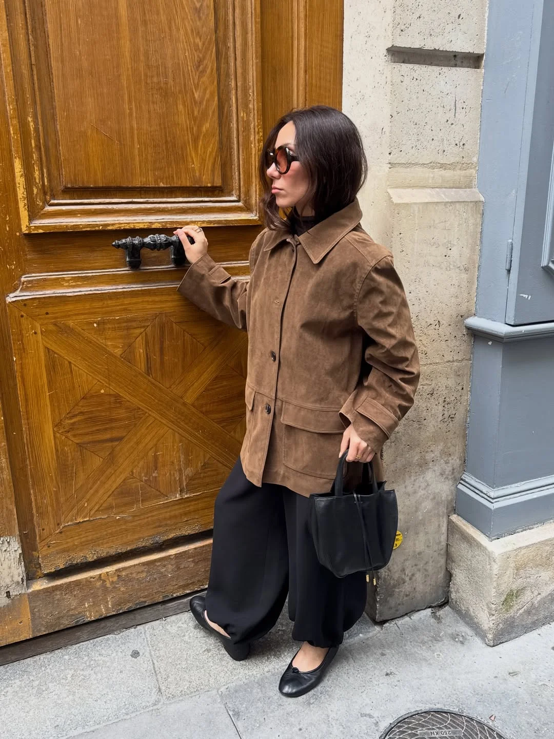 fall pants outfits 2026 Soft Suede Layers And Flowing Black Trousers