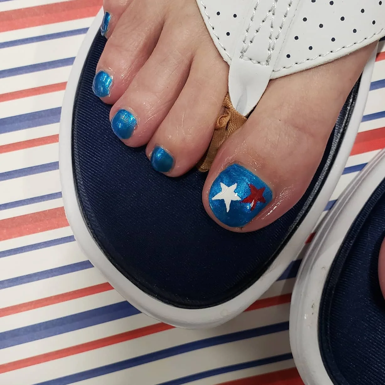 july toe nails design - summer ideas 2026 Shimmering Blue Star Pedicure With Modern Summer Energy