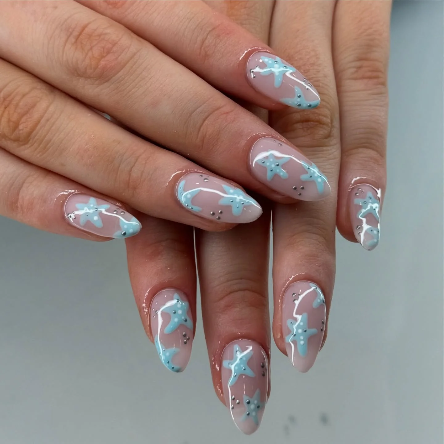 starfish summer nails 2026 Teal Ocean Waves And Modern Starfish Art