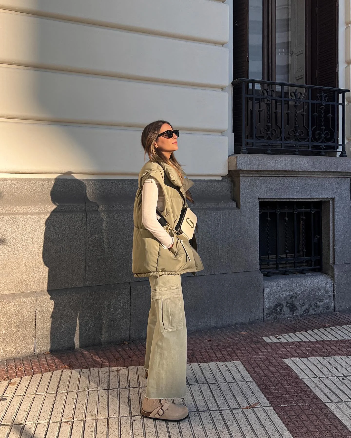 fall outfits with vests 2026 Modern Monochrome With A Puffer Vest
