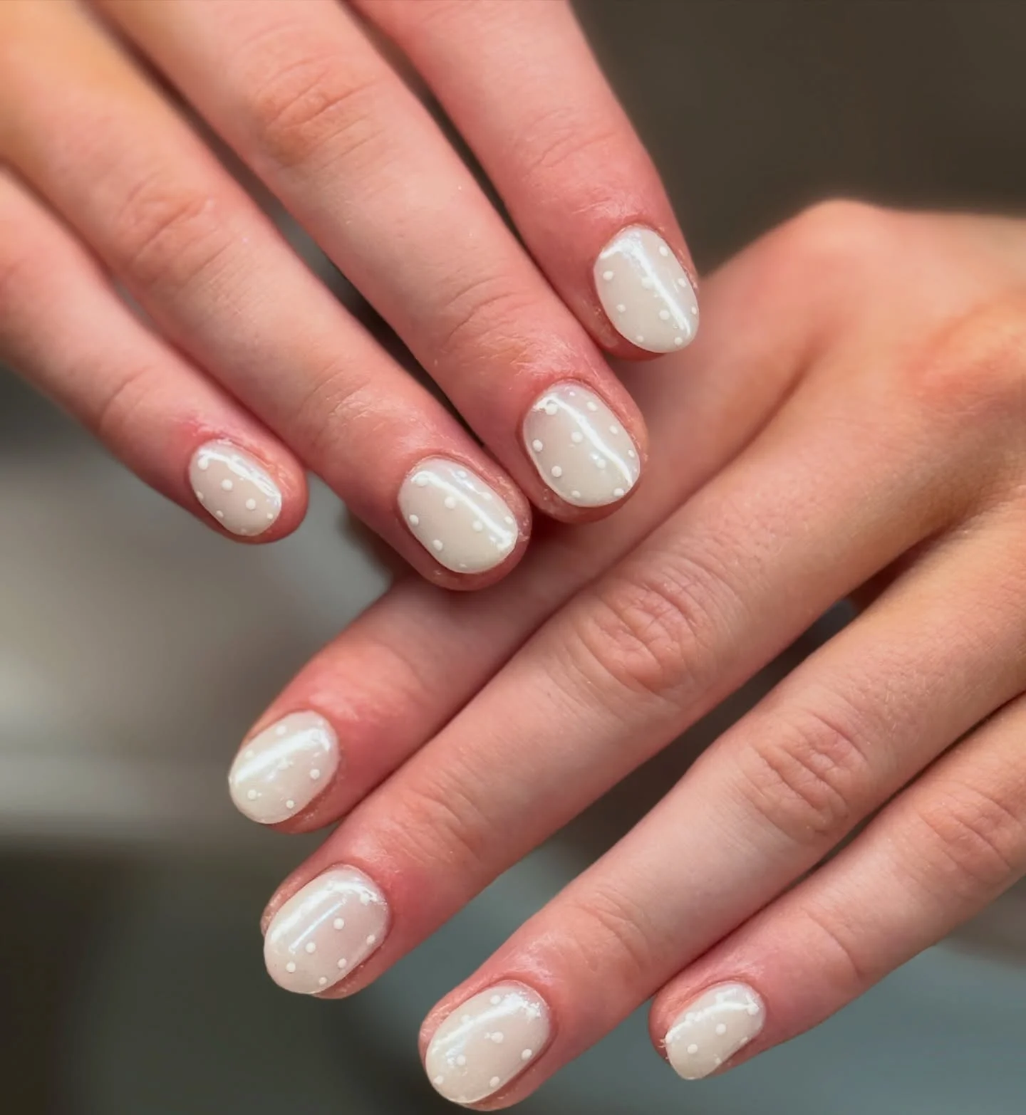 plain summer nails 2026 Soft Polka Dot Elegance In Creamy White