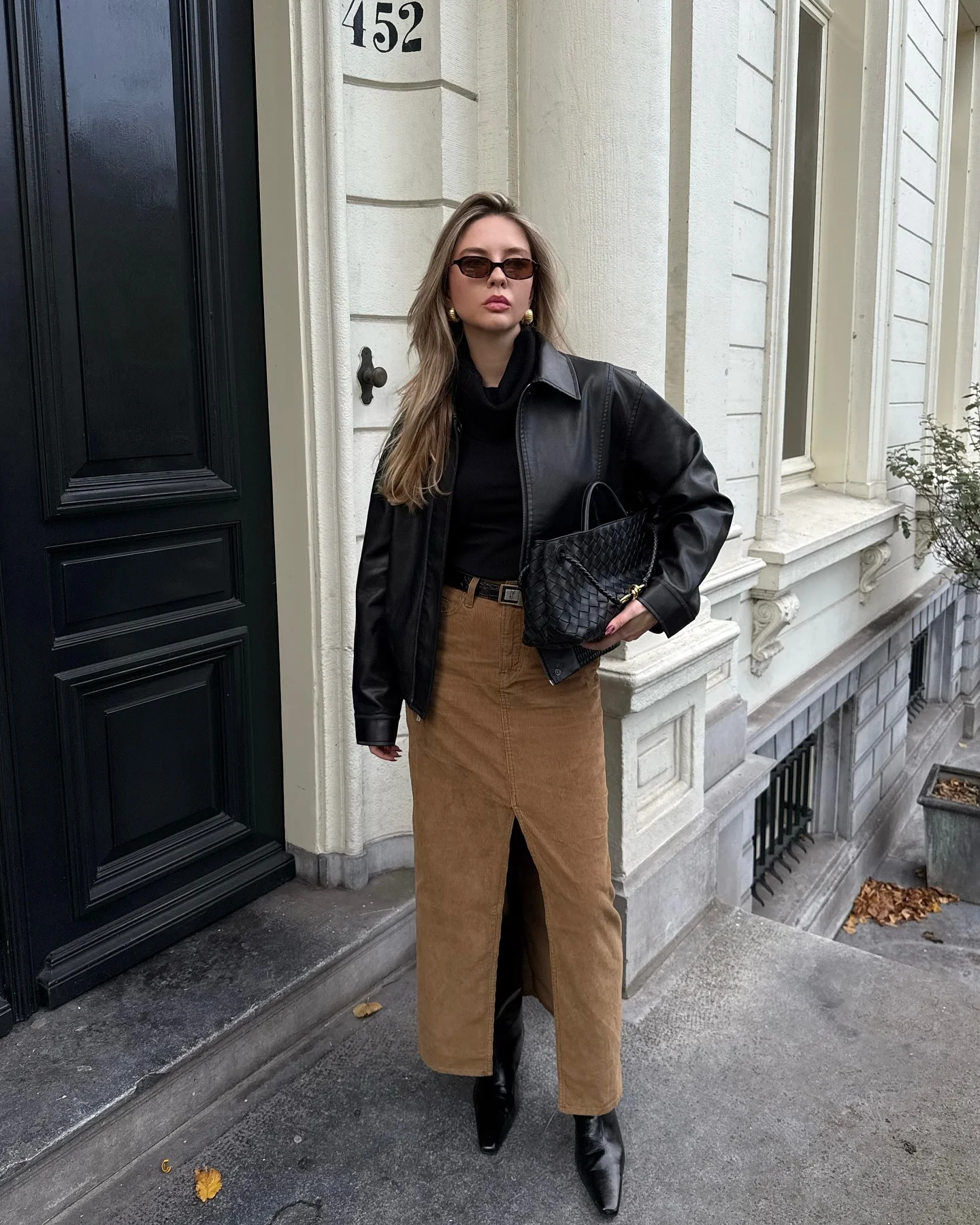 fall outfits with boots 2026 Chocolate And Black Layers With A Refined Midi Skirt