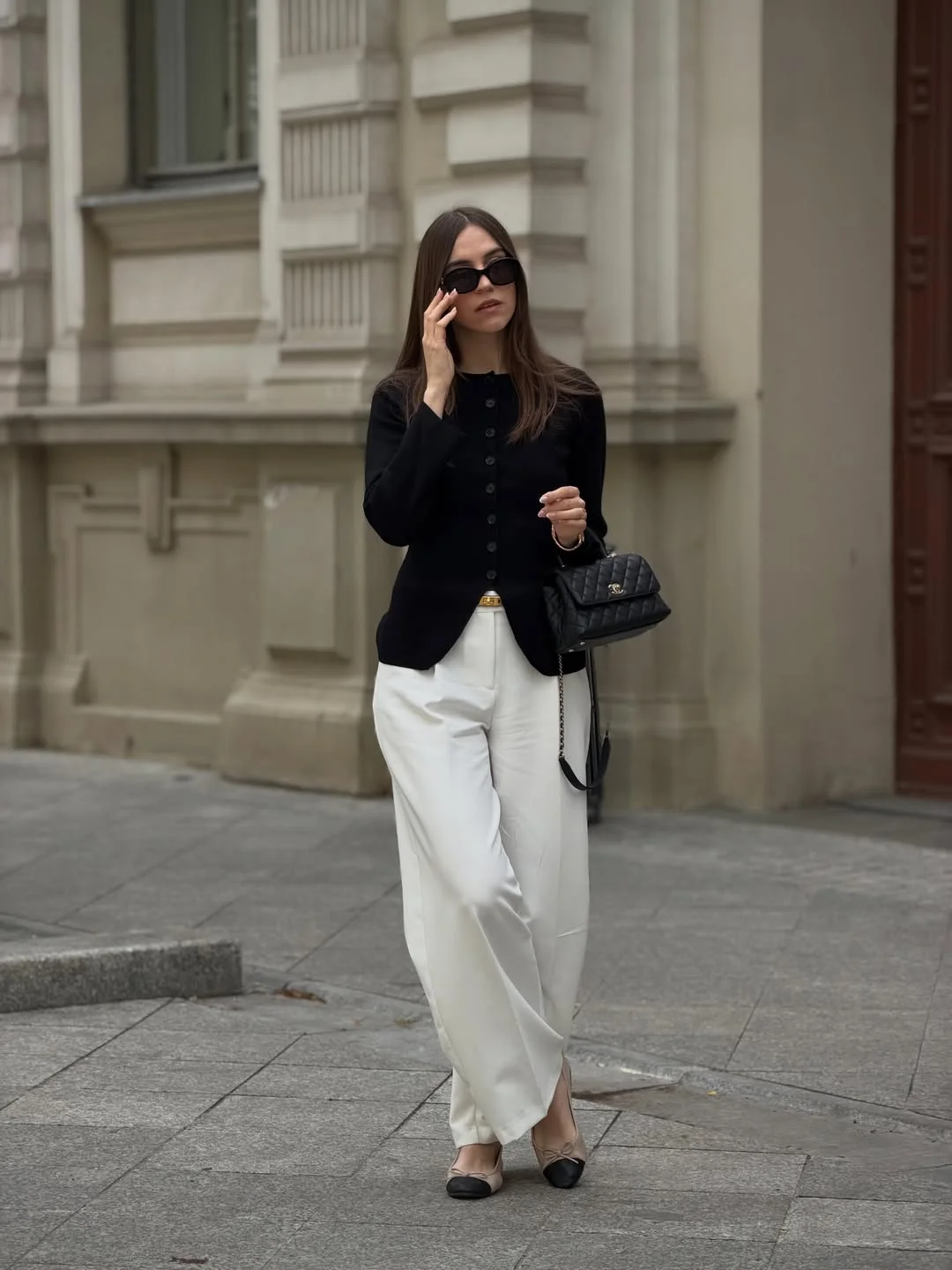 fall pants outfits 2026 Black Knitwear And White Trousers For Timeless Elegance