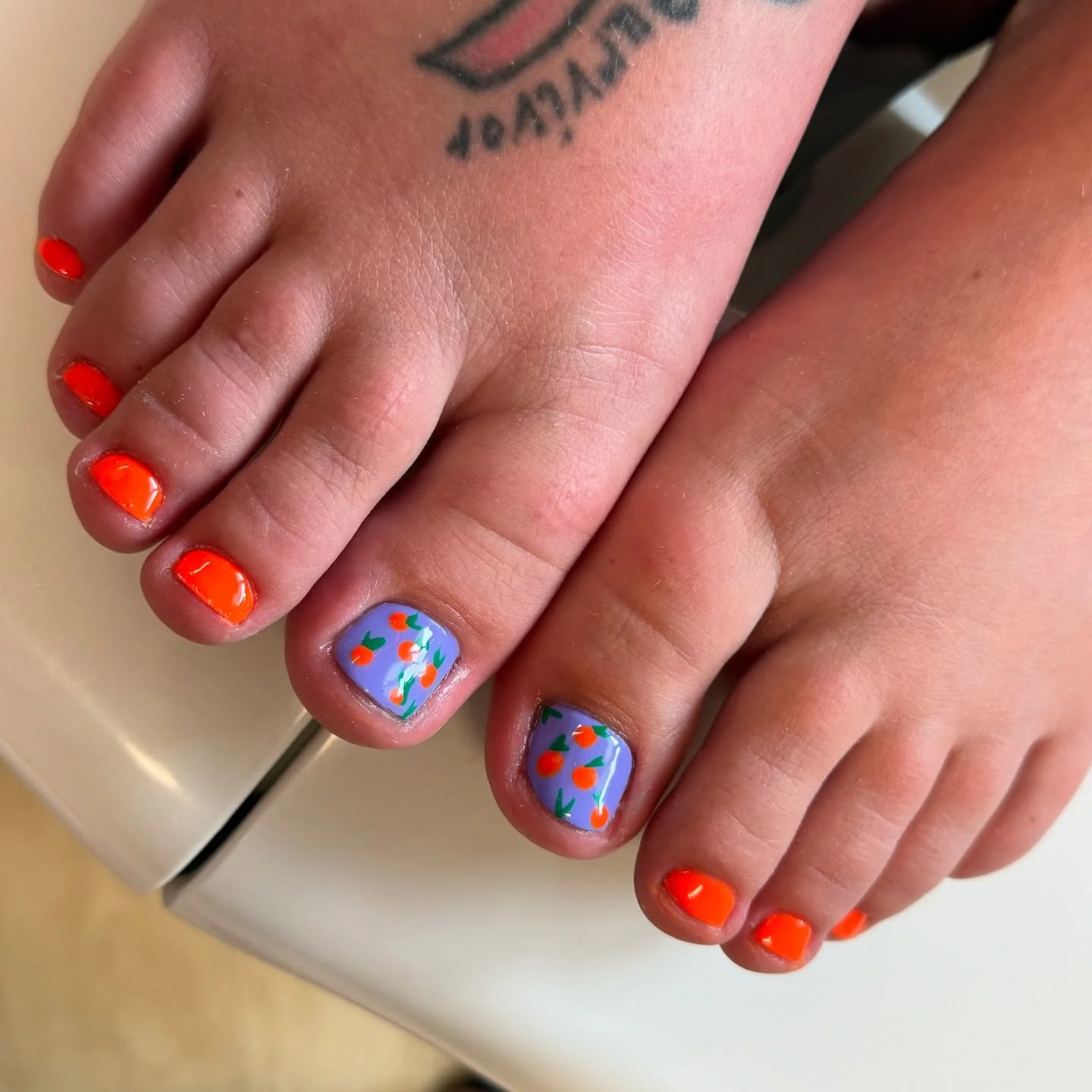 june pedicure ideas 2026 Bright Citrus Orange With Playful Fruit Details