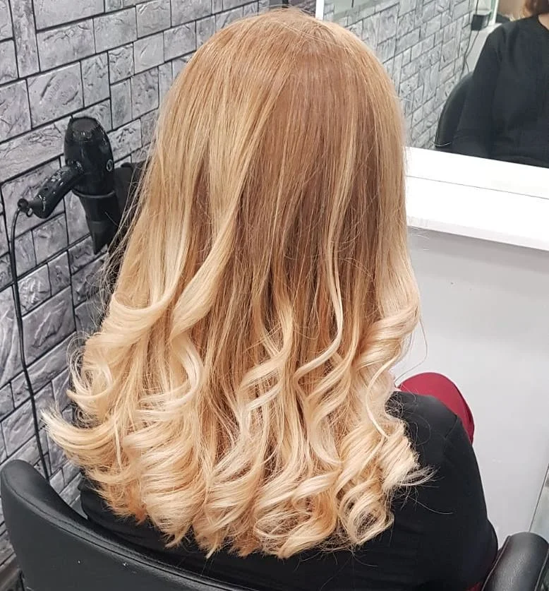 july hair color ideas Vanilla Cream Balayage With Soft Romantic Movement